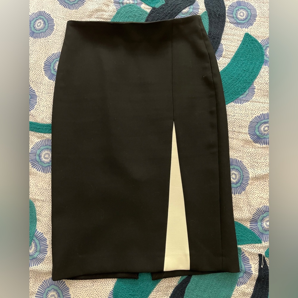 Black skirt with white accent in the front.  Size small